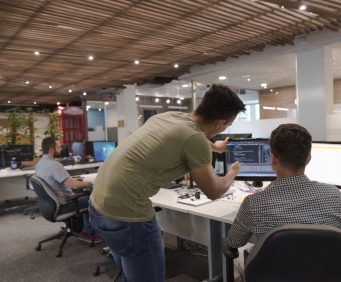 startup business people group working as team to find  solution to problem